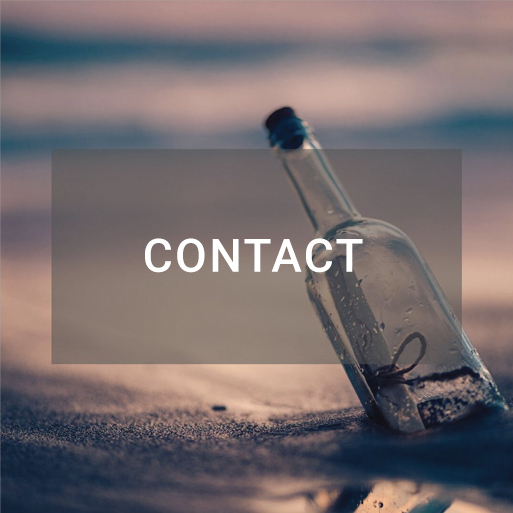an image of a message in a bottle stuck in the sand, with the word "Contact" in the center of the image.